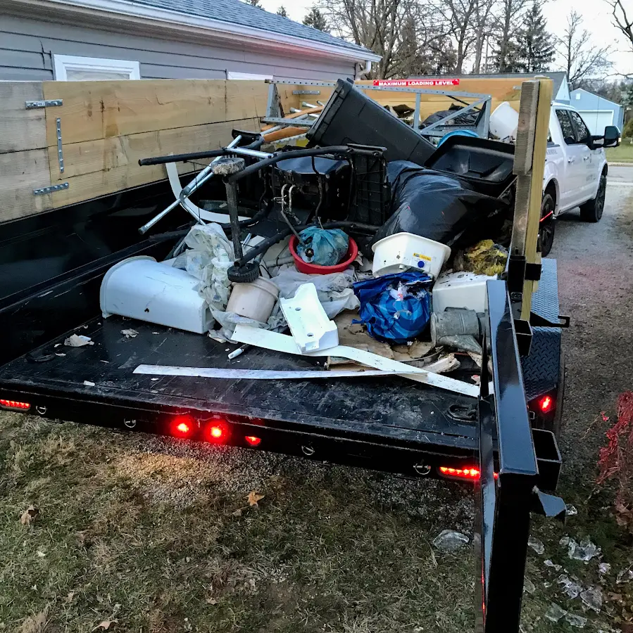 Roll-off dumpster delivered to a residential driveway in Melrose