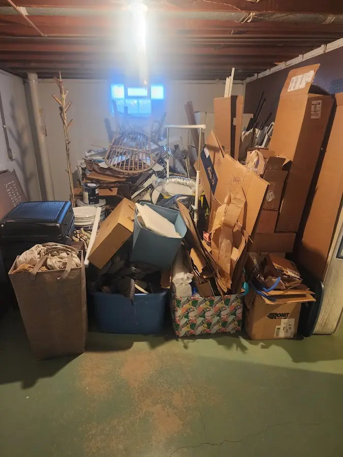 Roll-off dumpster container at job site for Construction Dumpster Rental in Melrose